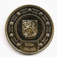 Suomen NATO jäsenyys   mitali kullannvärinen pillerissä