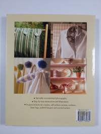 Laura Ashley decorating with textiles &amp; trimmings : essential and inspirational techniques, room by room