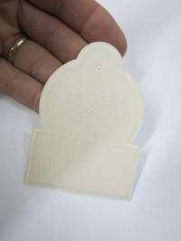 Asu -hintalappu / tuotetietolappu, merkin valmistaja Herman Mattsson Korkokuvapaino &amp; Pussitehdas, Vaasa