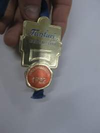 Tunturi - Laatumerkki - Turun Pyöräkellari 1922 -hintalappu / tuotetietolappu, merkin valmistaja Herman Mattsson Korkokuvapaino &amp; Pussitehdas, Vaasa