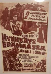 Elokuvajuliste; Hyökkäys erämaassa.KEHYSTETTY