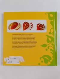 Syötävän koristeellista : kasviksista veitsellä leikaten (signeerattu, tekijän omiste)