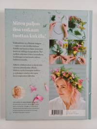 Kukkakirja : helpot ohjeet kimppuihin ja asetelmiin (signeerattu)