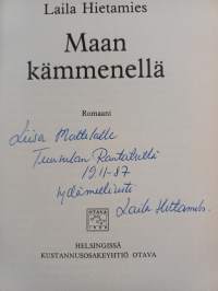 Maan kämmenellä (signeerattu, tekijän omiste)
