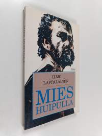Mies huipulla