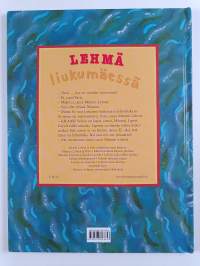 Lehmä liukumäessä