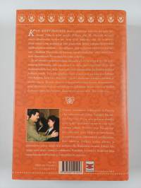 Kahden maailman välissä : Saddamin varjosta vapauteen