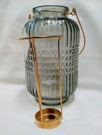 Harmaa lasinen tuikkulyhty käyttämätön