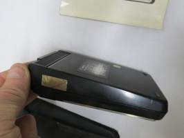 Canon Palmtronic F5 -taskulaskin + käyttöohjekirja + alkuperäinen kotelo