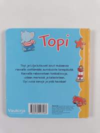 Topi rannalla