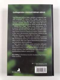 Tiger Woods : ihminen legendan takana