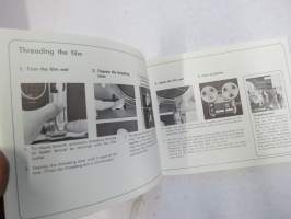 Elmo GP projektori -käyttöohje englanniksi sekä erillinen suomennos