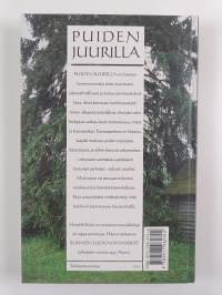 Puiden juurilla : puut ja pensaat luonnossa ja kansanperinteessä