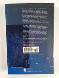 The edge of organization : chaos and complexity theories of formal social systems