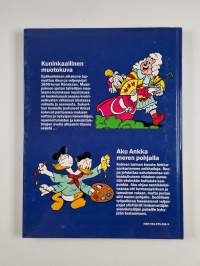 Parhaat sarjat 39 : Aku Ankka meren pohjalla ; Kuninkaallinen muotokuva