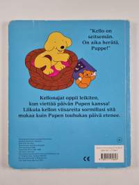 Puppe oppii kellonajat