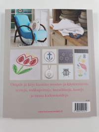 Kirjottu kissa ja muita kodin kirjontatöitä