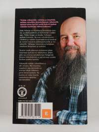 Ensimmäinen koira Kuussa : kootut kolumnit