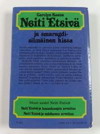 Neiti Etsivä ja smaragdisilmäinen kissa