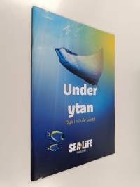 Under ytan : Dyk in i vår värld