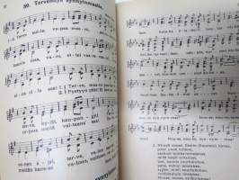 Nuorten laulukirja ja koululaisen musiikkitieto, kansikuvitus Martta Wendelin