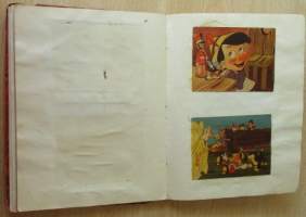 Muistokirja - 36 kiiltokuvasivua ja värssyjä - etukannen sisäluolella vuosiluku 194?