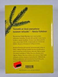 Hiljaisen hymyn mies : Veikko Huovisen elämä