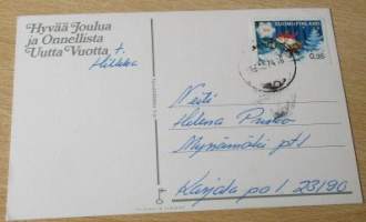 Postikortti - Joulukortti : Marjaliisa Pitkäranta - Joulupukki lahjasäkki mukana lähestyy taloa : Kulkenut, postilema ja Postimerkki 1974