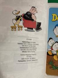 Punainen postimerkki. Aku Ankka.