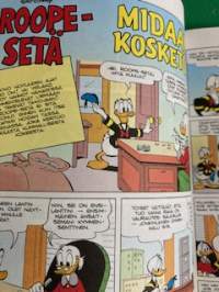 Punainen postimerkki. Aku Ankka.
