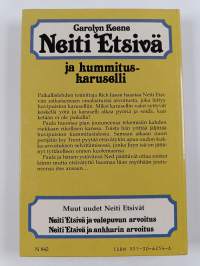 Neiti Etsivä ja kummituskaruselli