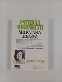 Muukalaisia junassa