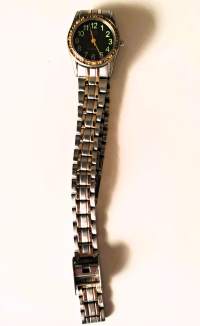 Q&amp;Q (Citizen Watch Co.) rannekello käy ( paristo vaihdettu  7/26)