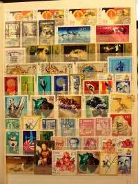 Filatelia - Postimerkkikokoelma 2 säilökirjassa: DDR n. 750 erilaista; Puola, Ranska, Ruotsi, Brasilia, Italia, Belgia, Jugoslavia, Romania ja Espanja (265 eril)