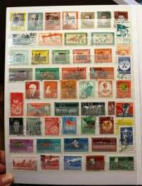 Filatelia - Postimerkkikokoelma 2 säilökirjassa: DDR n. 750 erilaista; Puola, Ranska, Ruotsi, Brasilia, Italia, Belgia, Jugoslavia, Romania ja Espanja (265 eril)
