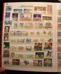 Filatelia - Postimerkkikokoelma 2 säilökirjassa: DDR n. 750 erilaista; Puola, Ranska, Ruotsi, Brasilia, Italia, Belgia, Jugoslavia, Romania ja Espanja (265 eril)