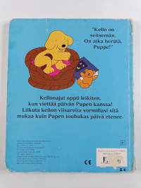 Puppe oppii kellonajat