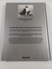 Koirien kieli : eleet, ilmeet, käyttäytyminen