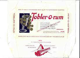 Tobler-O-rum-suklaalevyn kääre  suklaakääre makeiskääre 1960-luku - tuote-etiketti