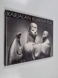 Karjalan kukkiva puu : Eva Ryynänen ja hänen taiteensa = The flowering tree of Karelia : Eva Ryynänen and her art