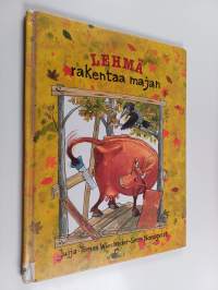 Lehmä rakentaa majan
