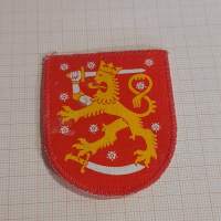 Suomi-leijona merkki vaakuna merkki kangasta