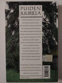 Puiden juurilla : puut ja pensaat luonnossa ja kansanperinteessä