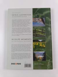 Hetkiä luonnossa : vuodenkierto kuvina = Wildlife moments : the four seasons in photographs