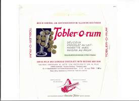 Tobler-O-Rum Sveitsi  -suklaalevyn kääre on peräisin 1950-luku suklaakääre kohopaino - tuote-etiketti