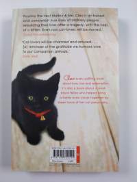 Cleo : how a small black cat helped heal a family