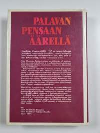 Palavan pensaan äärellä : Eino I Mannisen persoona ja elämäntyö
