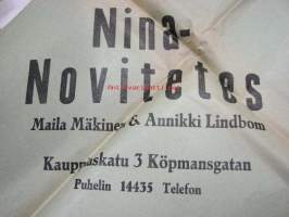 Nina Novitetes Maila Mäkinen &amp; Annikki Lindbom -vaatekaupan paperipussi