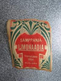 Virvoitusjuomatehdas Toiwo Weiss, Kuru, Samppanja-Limonaadia -etiketti