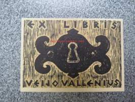 Ex Libris Veijo Vallenius -kirjanomistajan merkki